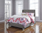 Coralayne Full Upholstered Panel Bed